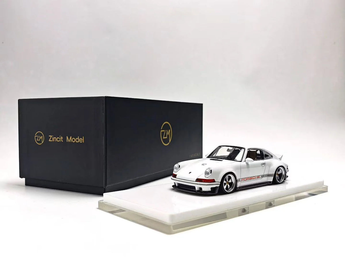 ZINCIT Model 1:64 Porsche 911 Singer DLS White Diecast Model Car with Silver Five-Spoke Wheels, Porsche Side Stripes, Rear Spoiler, White Display Base and Original ZINCIT Model Packaging Box – Front Three-Quarter View