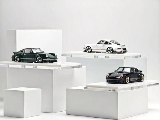 ZINCIT Model 1:64 Porsche 911 Singer DLS Diecast Model Car Collection in Green, White and Black with Detailed Wheels, Porsche Side Stripes and Rear Spoilers – Three Color Variants Displayed on White Platforms
