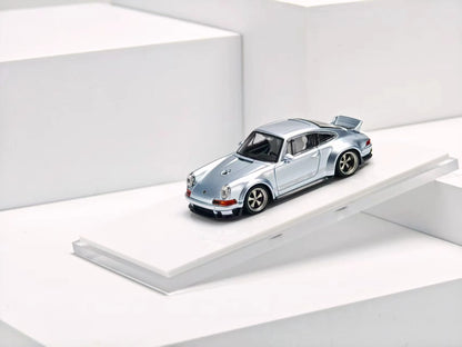 ZINCIT Model 1:64 Porsche 911 Singer DLS Metallic Ice Blue Diecast Model Car with Silver Five-Spoke Wheels, Widebody Styling, Rear Spoiler and Detailed Interior – Front Three-Quarter View