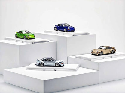 ZINCIT Model 1:64 Porsche 911 Singer DLS Diecast Model Car Collection in Green, Blue, Gold and Silver with Detailed Wheels, Rear Spoilers and Custom Body Styling – Four Color Variants on Display Platforms