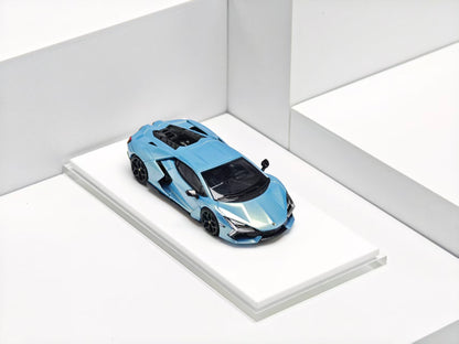 Blue sports car model on a white platform with a white background