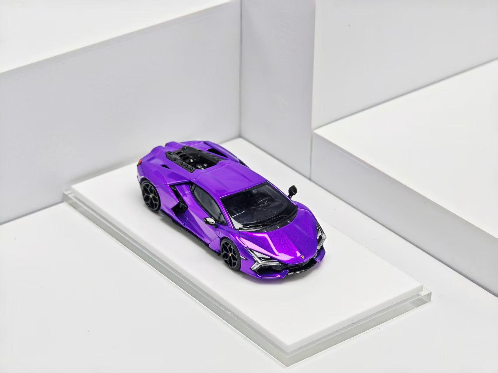 Purple sports car on a white platform with a white background