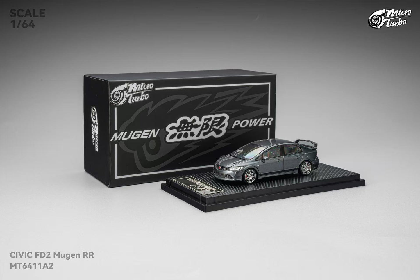Model car of a Civic FD2 Mugen RR with packaging displaying 'Mugen' branding on a gray background.