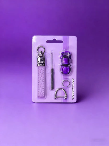 Purple keychain set with tools on a purple background