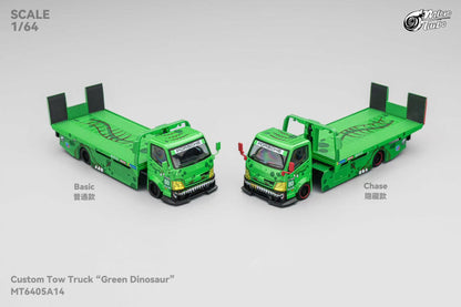 Two green toy tow trucks on a white background with scale information.
