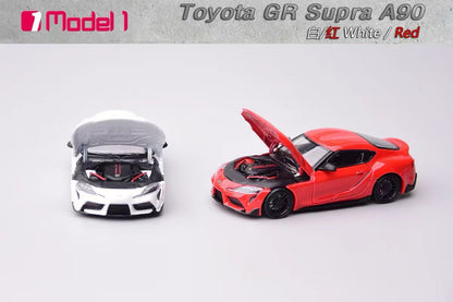 Model toy car of Toyota GR Supra A90 with open hood on a gray background