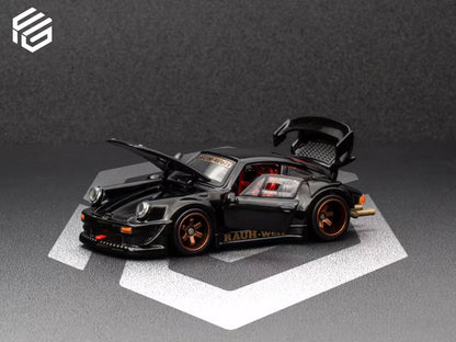 Black model car with open doors on a gray background