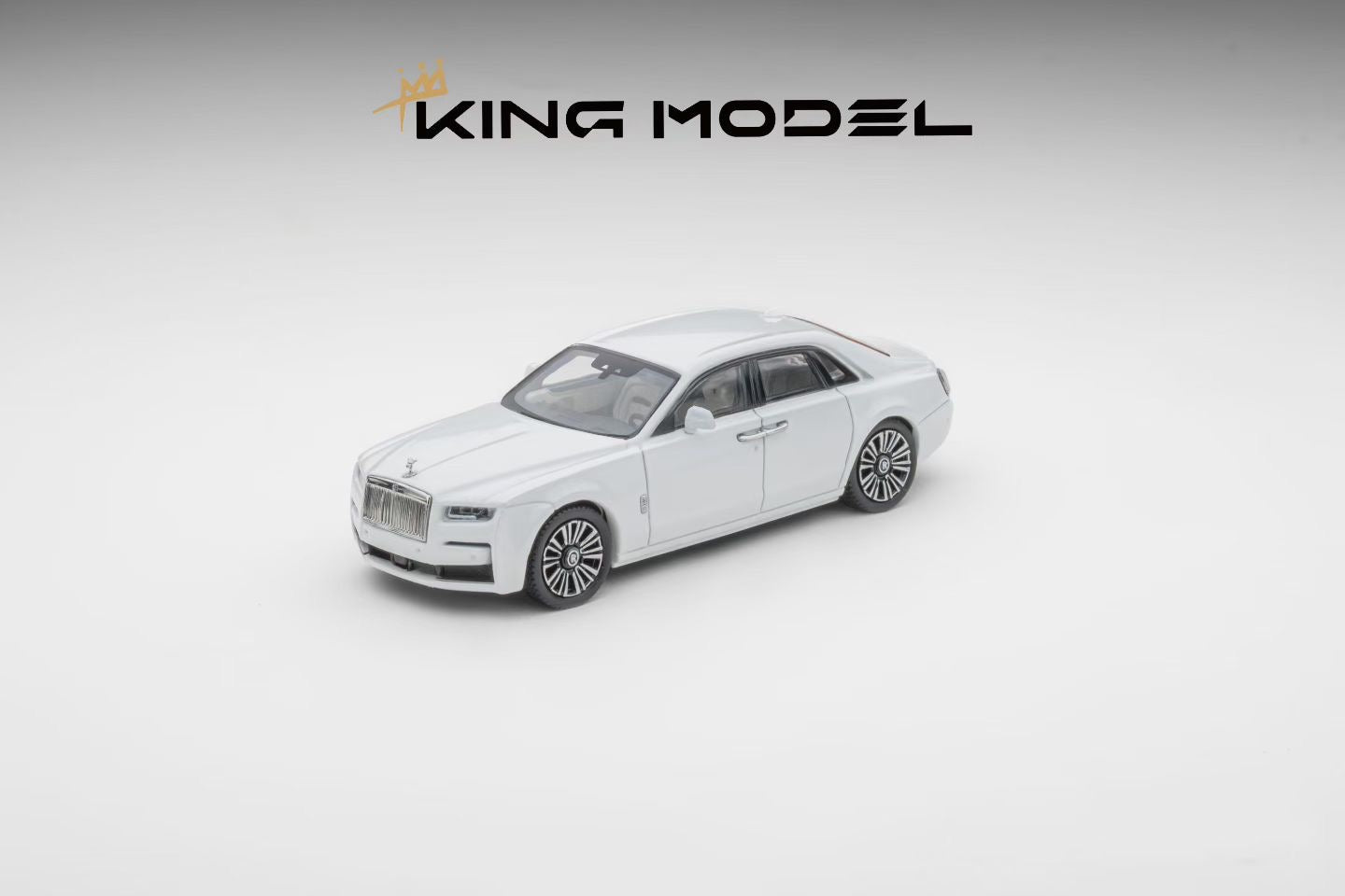 White model car on a gray background with 'King Model' branding.