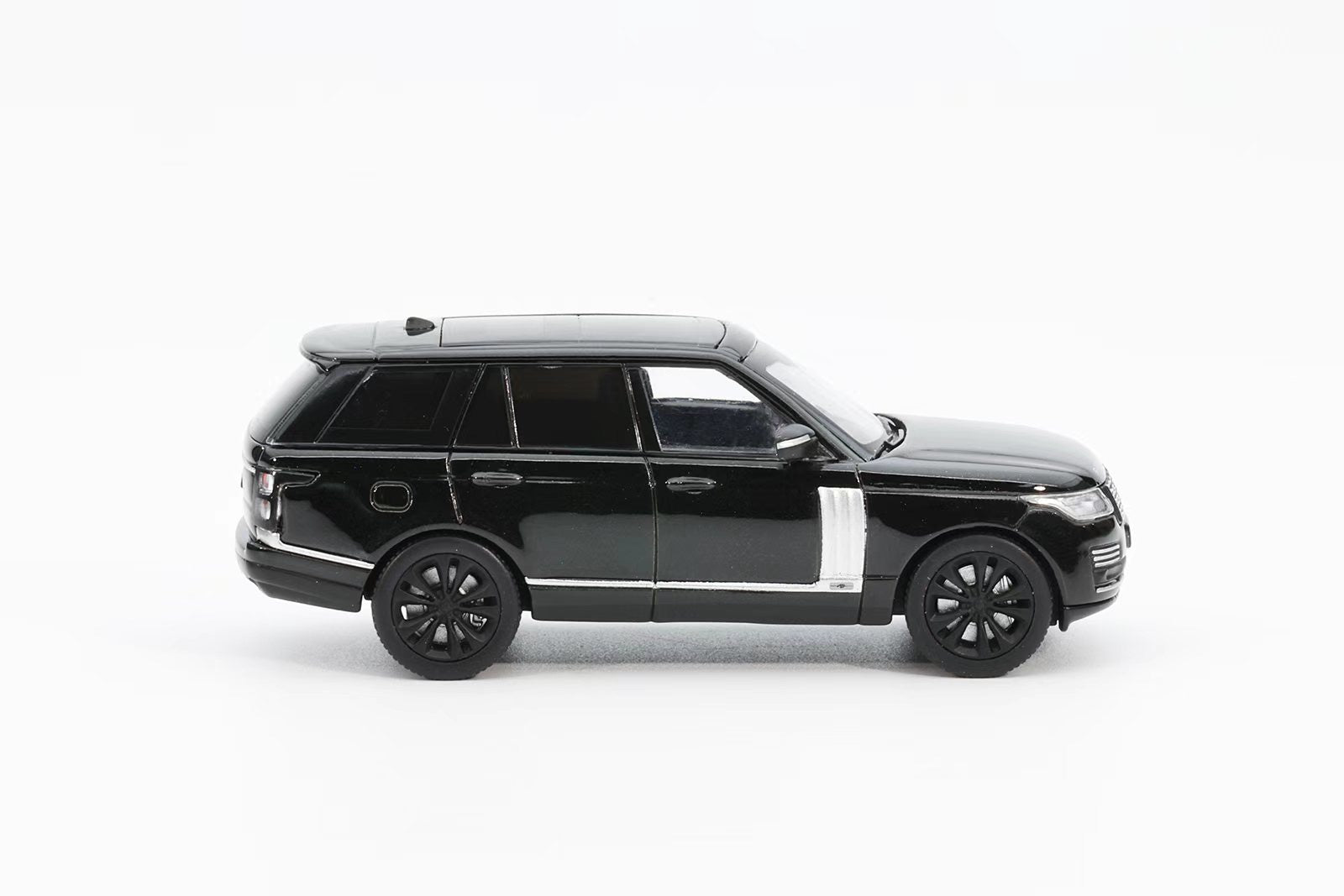 Black SUV model on a white background