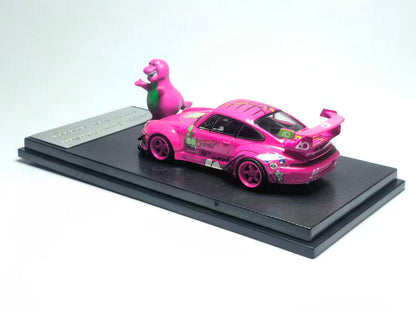 Pink toy car with a dinosaur figure on a black platform