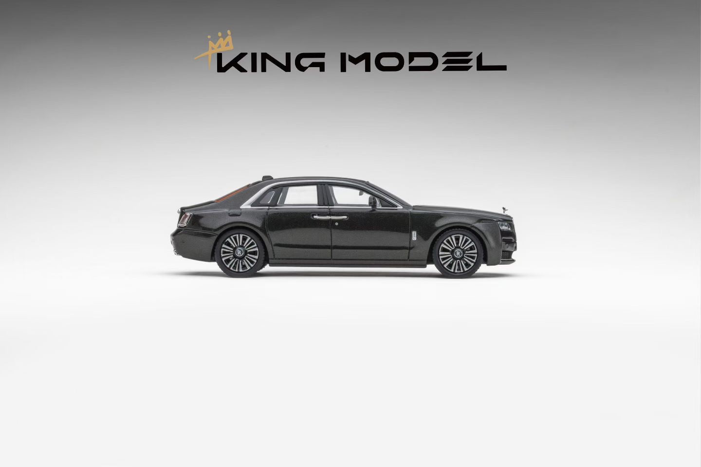 Black luxury car on a gray background with 'KING MODEL' branding.