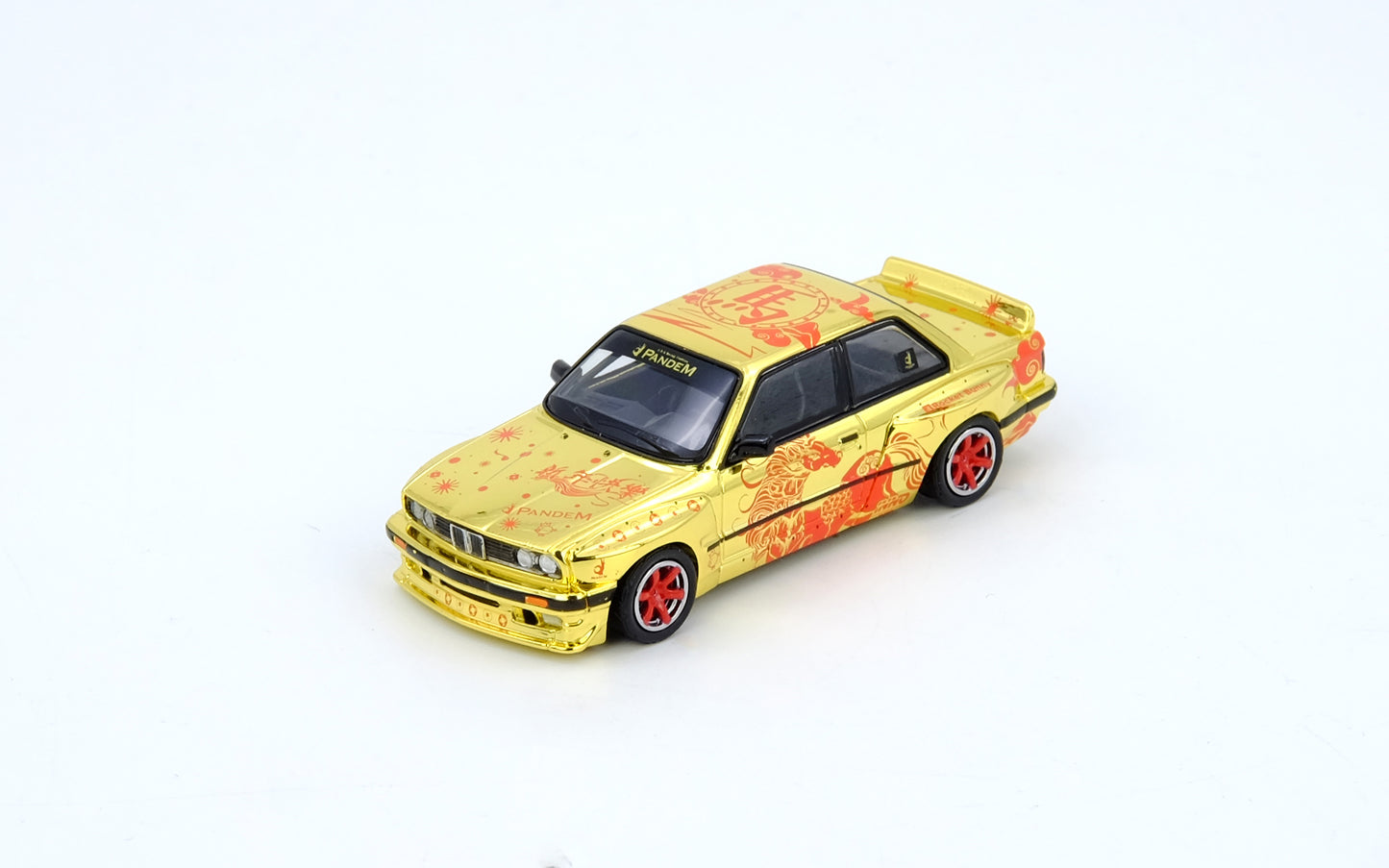 Model car with floral design on a white background