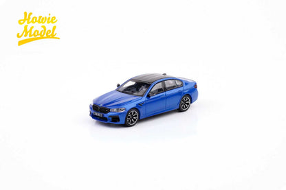 Blue model car on a white background with 'Howie Model' branding.