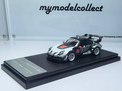 Model car on a display stand with 'mymodelcollect' branding.