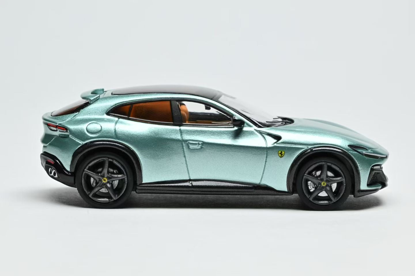 Luxury SUV with a metallic finish on a gray background