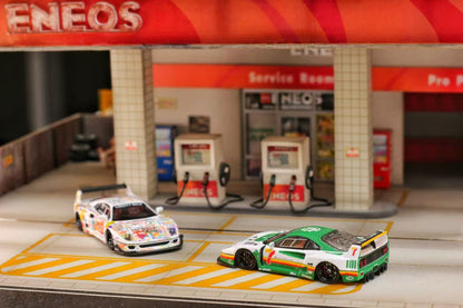 Model cars at a gas station with ENEOS branding