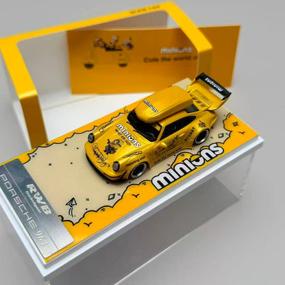 Yellow model car in a display box with 'minions' branding