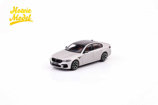 Model car of a BMW on a white background with 'Howie Model' branding.