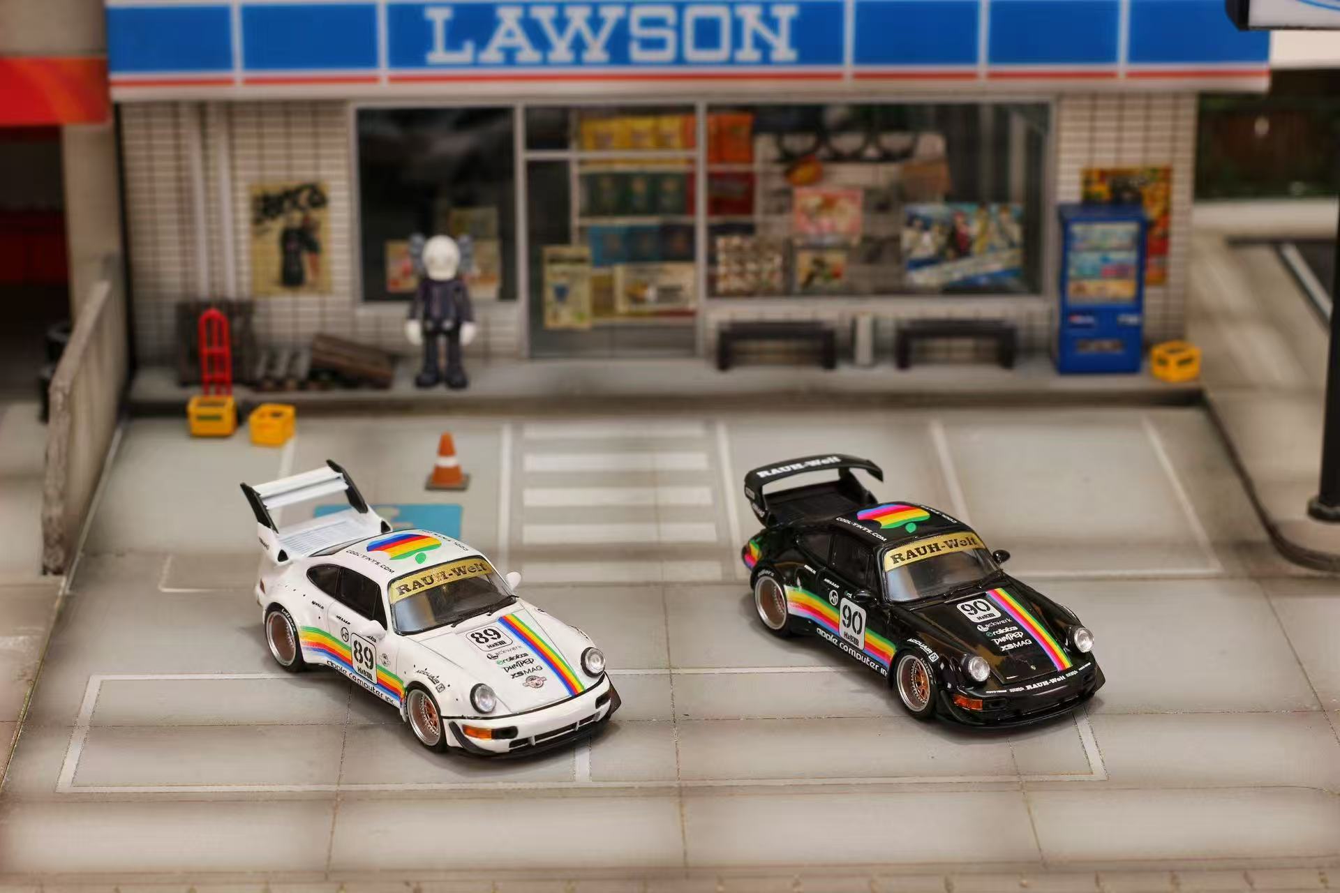 Two toy cars in front of a Lawson store.
