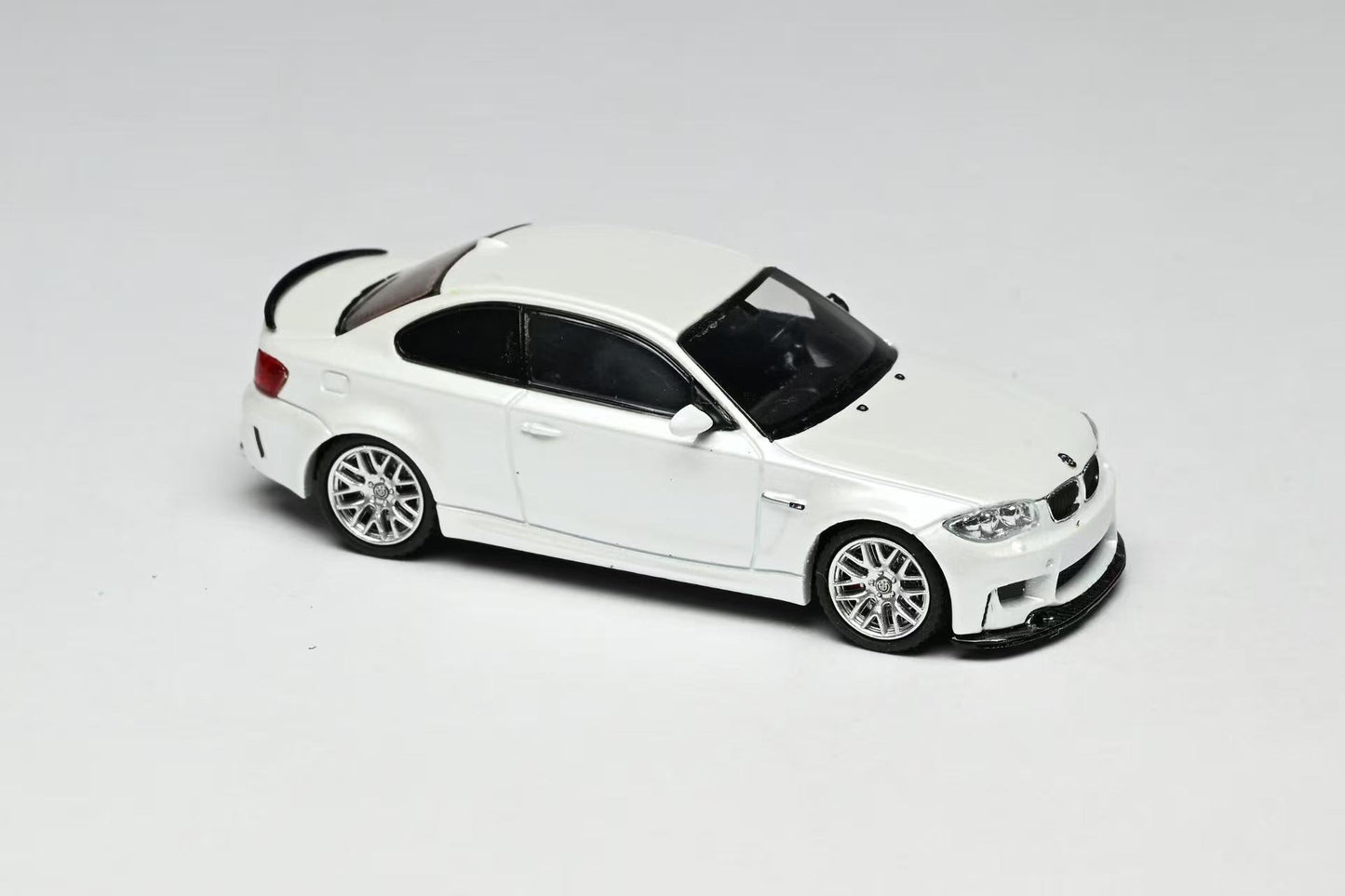 White model car on a gray background