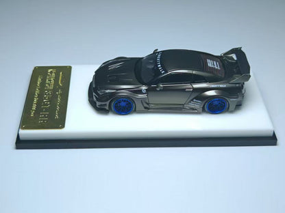 Model car on a display stand with a plaque on a light gray background