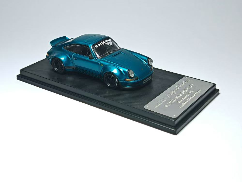 Model car on a display stand with a white background