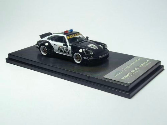 Model police car on a display stand with a white background