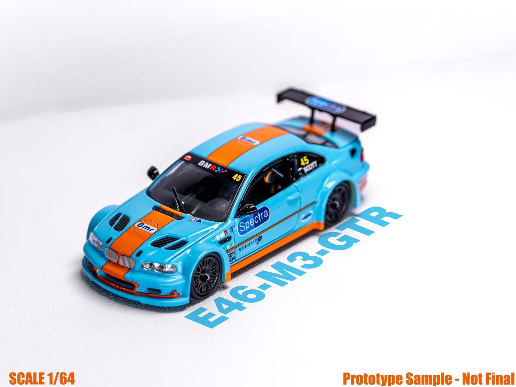 Model car with blue and orange design on a white background