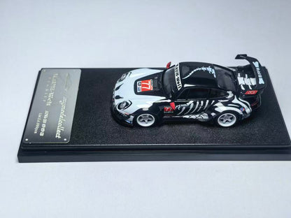 Model car on a display stand with a white background