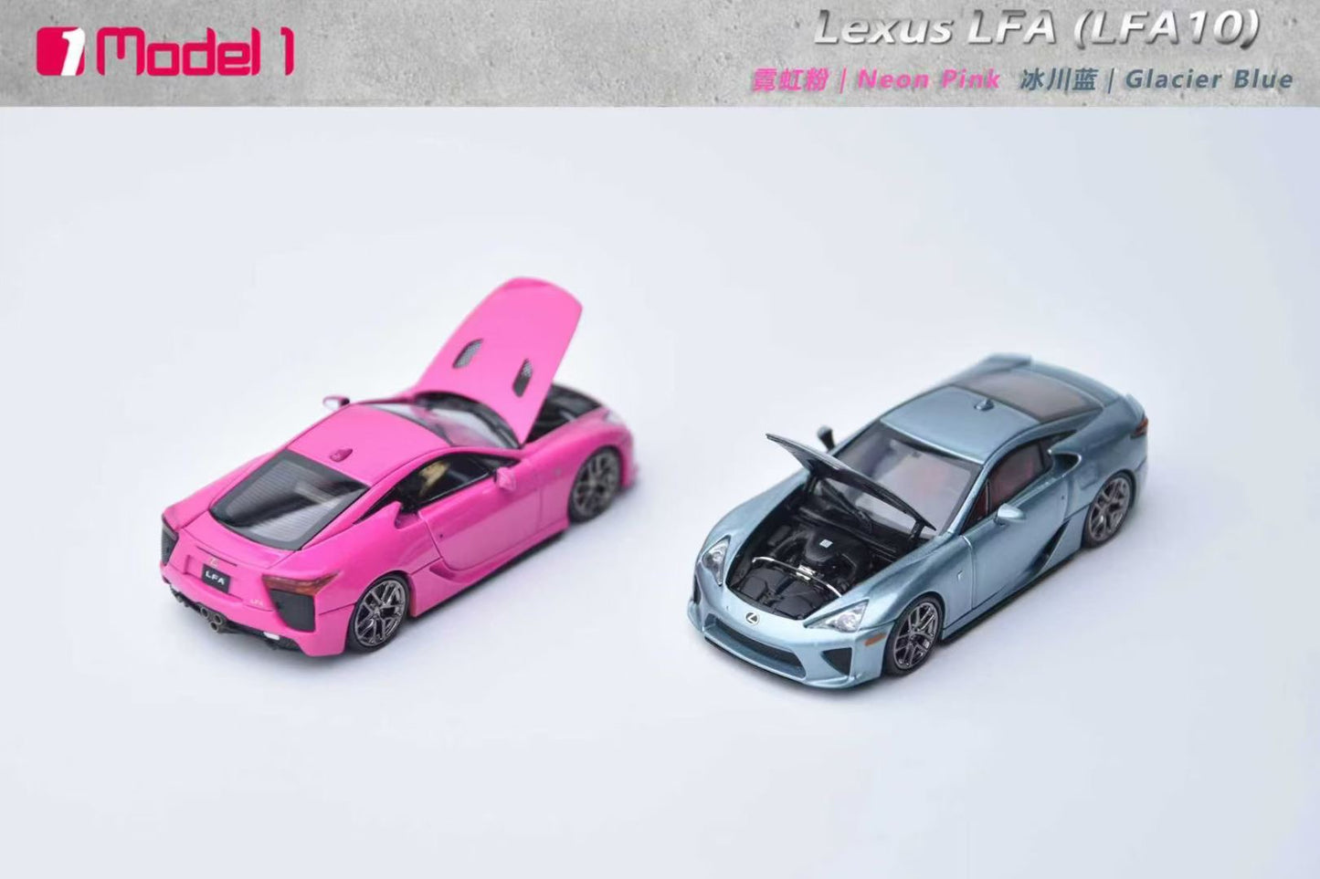 Two toy model cars, one pink and one blue, on a light gray background with 'Model' branding.