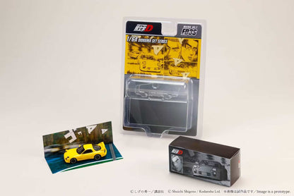 Model car kit packaging with a yellow model car on a white background
