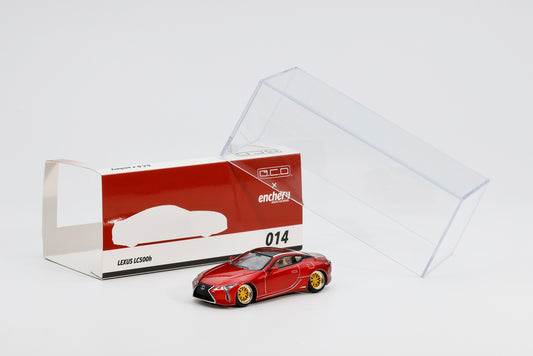 Red Lexus LC500 model car with packaging on a white background