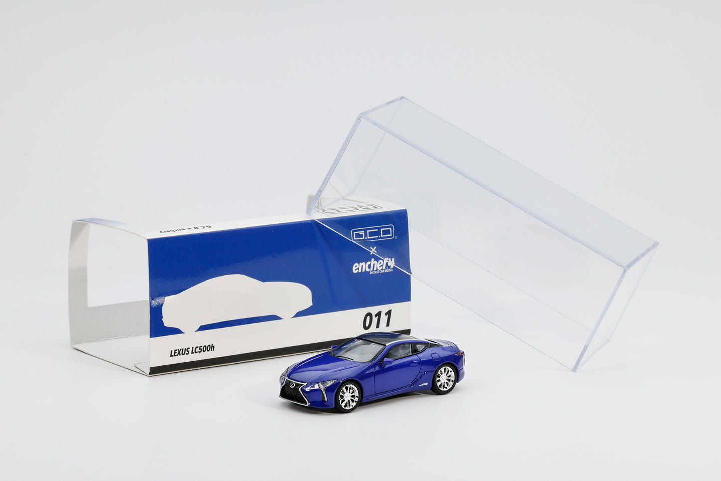 Blue Lexus model car with packaging on a white background