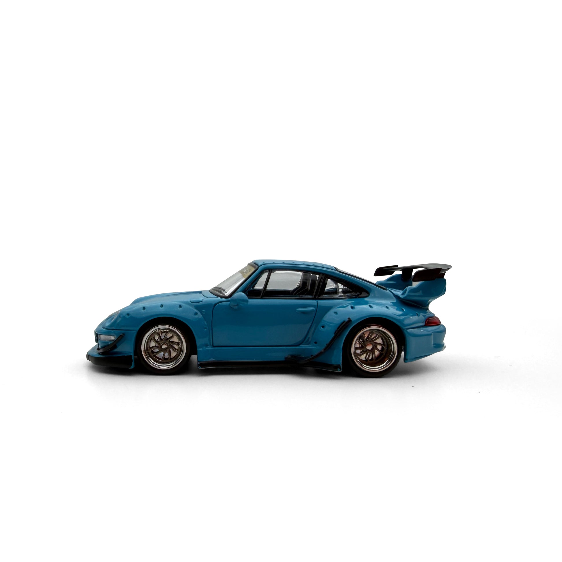 Blue model car on a white background